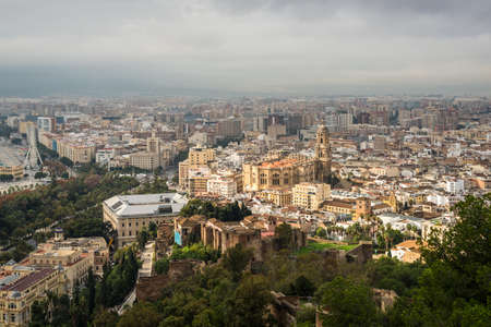 Malaga, Spain - December 7, 2016: Cityscape aerial view and the Cathedral of Malaga before the rain in Malaga, Andalusia, Spain.のeditorial素材