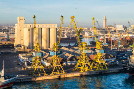 Casablanca, Morocco - December 8, 2016: The scene early in the morning with harbor cranes, elevators, ships and cargoes in the seaport of Casablanca, Morocco.のeditorial素材