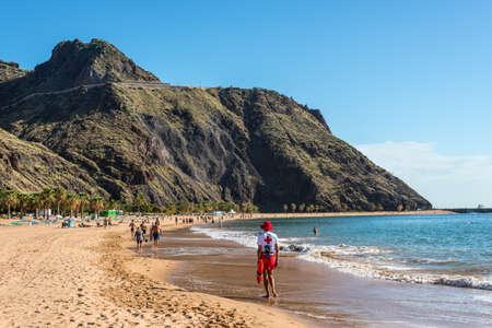 Santa Cruz de Tenerife, Canary Islands, Spain - Desember 11, 2016: Lifeguard on the famous Las Teresitas beach near Santa Cruz de Tenerife in the north of Tenerife, Canary Islands, Spain.のeditorial素材