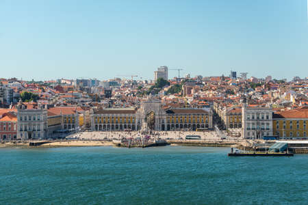 Lisbon, Portugal - May 19, 2017: Lisbon cityscape, view of the old town Alfama from the Tagus River, Portugal. Commerce square (Praca do comercio) in the foreground.のeditorial素材