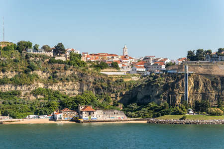 Lisbon, Portugal - May 19, 2017: Waterfront view of the Small Town Cacilhas in District Almada near...