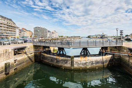 Cherbourg-Octeville, France - May 22, 2017: Dam and bridge over the canal (the lock of the harbor) in Cherbourg-Octeville, Normandy, France.のeditorial素材