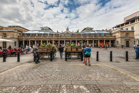 London, UK - May 23, 2017: Covent Garden market, one of the main tourist attractions in London, known as restaurants, pubs, market stalls, shops and public entertaining in London, England, United Kingdom.のeditorial素材