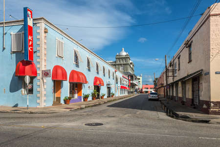 Bridgetown, Barbados - December 18, 2016: Architecture in the historic part of Bridgetown, Barbados, Caribbean. The Kentucky Fried Chicken (KFC) Restaurant in the left.のeditorial素材