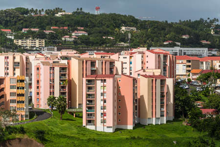 Fort-de-France, Martinique - December 19, 2016: Residential buildings on a slope in the Fort-de-France, Martinique, Lesser Antilles, West Indies, Caribbean. View from the cruise ship in cloudy weather.のeditorial素材