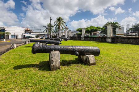 Fort-de-France, Martinique - December 19, 2016: Ancient cannon on display in front of the Fort Saint Louis in Fort-de-France, France's Caribbean overseas department of Martinique, Lesser Antilles, French West Indies.のeditorial素材