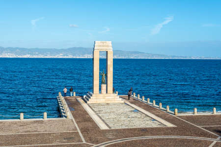 Reggio Calabria, Italy - October 30, 2017: Athena goddess Statue and Monument to Vittorio Emanuele at Arena dello Stretto in Reggio Calabria, Italy. The ancient goddess of philosophy and wisdom.のeditorial素材