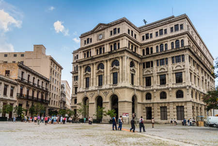Havana, Cuba - September 10, 2013: Old square with old spanish building with clock, plaza Vieja,...