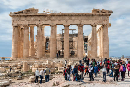 Athens, Greece - November 1, 2017: Many tourists visiting ancient temple Parthenon on Acropolis. Acropolis of Athens is an ancient citadel located on a rocky outcrop above the city of Athens.のeditorial素材