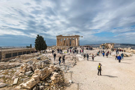 Athens, Greece - November 1, 2017: Many tourists visiting ancient temple Parthenon on Acropolis. Acropolis of Athens is an ancient citadel located on a rocky outcrop above the city of Athens.のeditorial素材