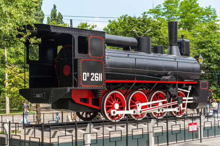 Kyiv, Ukraine - June 1, 2019: Monument to the old steam train (Years built steam locomotive...