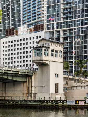 Miami, FL, United States - April 20, 2019: The Brickell Bridge Miami over the River in the popular...