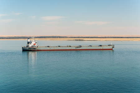 Suez, Egypt - November 5, 2017: General Cargo Ship ATLANTIC HORIZON passing the New Suez Canal (The Great Bitter Lake) near Suez, Egypt, Africa.のeditorial素材