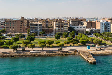 Port Tawfiq, Egypt - November 5, 2017: Buildings on the shore of the Suez Canal in Port Tawfiq...