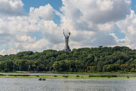 Kyiv, Ukraine - July 13, 2019: View of Dnipro river and the Motherland monument. Symbol of Kyiv (Kiev). The National Museum of the History of Ukraine in the Second World War. Kyiv skyline, cityscape.のeditorial素材