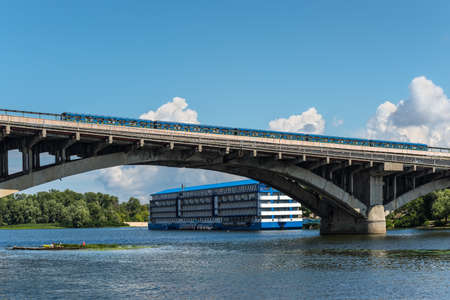 Kyiv, Ukraine - July 13, 2019: Metro Bridge is part of the Brovarsky prospect spanning across the...