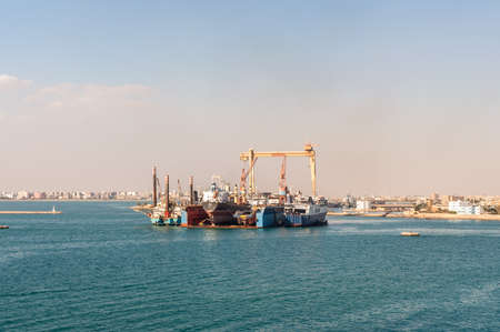 Port Tewfik, Egypt - November 5, 2017: Dry dock at the Port Tewfik in the suburbs of Suez. The Suez Port is an Egyptian port located at the southern boundary of Suez Canal.のeditorial素材
