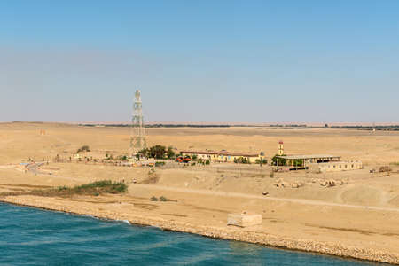 Suez, Egypt - November 5, 2017: Military built and telecommunication tower on the shore of the Suez Canal near Suez, Egypt, Africa.のeditorial素材