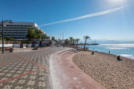 Eilat, Israel - November 7, 2017: Central promenade and public resting beach in Eilat - famous...