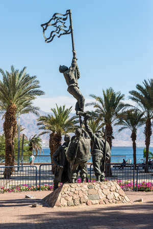 Eilat, Israel - November 7, 2017: Monument of famous Ink Flag erection in Eilat, Israel. In 1949, Israeli forces reached the police station and raised an improvised flag prepared from a shirt and ink.のeditorial素材