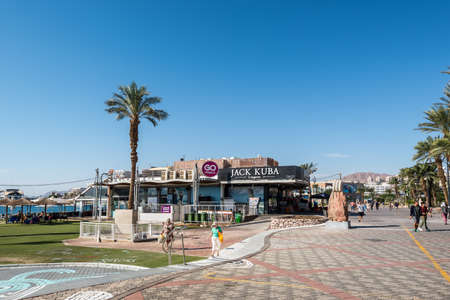 Eilat, Israel - November 7, 2017: Central promenade and public resting beach in Eilat - famous resort and recreational city in Israel.のeditorial素材