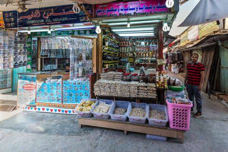Salalah, Oman - November 12, 2017: Street view of Salalah city at day and tourist shops at Al Husn or Haffa Souk in Salalah, Oman.This souk is the biggest frankincense souk in southern Oman.のeditorial素材