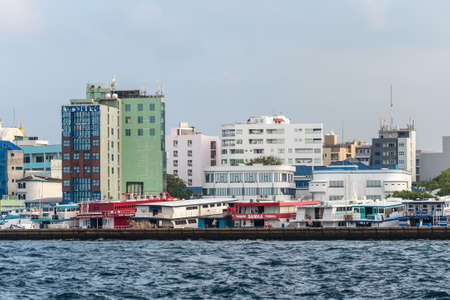 Male, Maldives - November 17, 2017: Waterfront cityscape of Male city as seen from the boat in Maldives, Indian Ocean.のeditorial素材