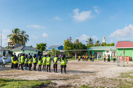 Huraa, Maldives - November 20, 2017: Local schoolgirls ready to play volleyball for the championship of the Huraa Island, Maldives.のeditorial素材
