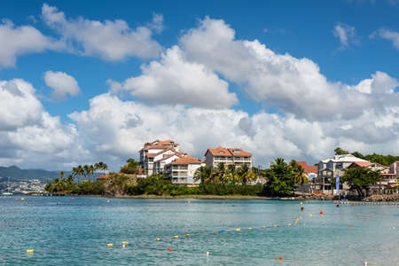 Les Trois-Ilets, Martinique - December 13, 2018: Tropical Anse Mitan Beach at Les Trois-Ilets, peninsula La Pointe du Bout, Martinique, FWI. One of the most popular tourist spot in Martinique.のeditorial素材
