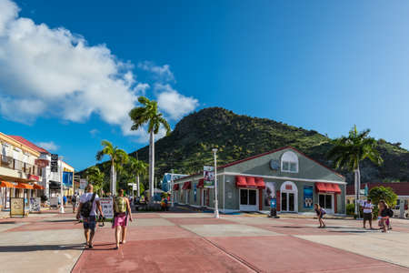 Philipsburg, St. Maarten - December 17, 2018: Cruise ship passengers enter the St. Maarten port and...
