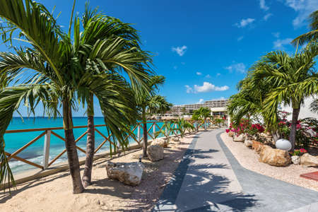 Maho beach, Saint Martin - December 17, 2018: Path to the Tortuga Beach Cafe near the famous Maho beach in famous touristic destination.のeditorial素材
