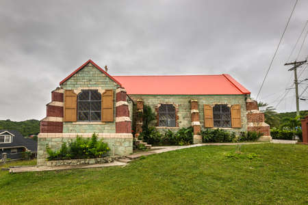St John's, Antigua and Barbuda - December 18, 2018: St. Barnabas Anglican Church in St John's in cloudy weather, Antigua and Barbuda.のeditorial素材