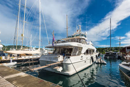 English Harbour, Antigua and Barbuda - December 18, 2018: Luxury motor yachts docked at the Antigua yacht club in English Harbour, St. Paulâs Parish, Antigua And Barbuda.のeditorial素材
