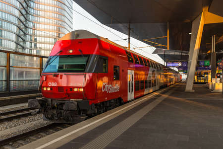Vienna, Austria - April 17, 2019: Red train from the Austrian Federal Railway company,...
