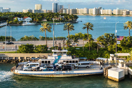 Miami, FL, United States - April 20, 2019:  View of MacArthur Causeway and the Fisher Island Ferry at Biscayne Bay in Miami, Florida, United States of America.のeditorial素材