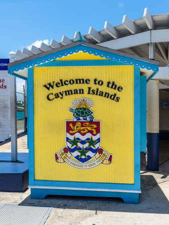 George Town, Grand Cayman Island, UK - April 23, 2019: This is a colorful welcome sign "Welcome to the Cayman Islands" seen on Cayman Islands in George Town, Grand Cayman, Cayman Islands.のeditorial素材