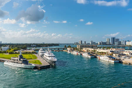 Miami, FL, United States - April 28, 2019: Luxury yachts and U.S. Coast Guard boats docked in the Biscayne Bay, Miami, Florida, United States of America.のeditorial素材