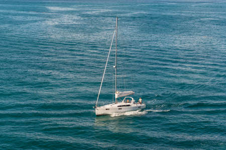 Miami, FL, United States - April 28, 2019: Sailing yacht in the Atlantic Ocean in Miami, USA. Summer...