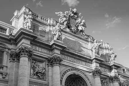 Rome, Italy - November 8, 2019: Roman architecture. Portico of the Trevi Fountain. It is one of the most popular tourist attractions in Rome. Black and white (B&W).のeditorial素材