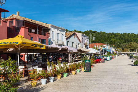 Katakolo, Greece - November 11, 2019: Shops and restaurants in the port of Katakolo on the Greek coast and serves as the gateway to Olympia, Greece.のeditorial素材