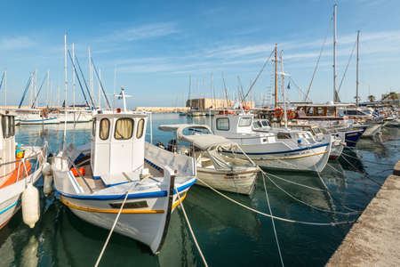Heraklion, Greece - November 12, 2019: Wooden tourist and fishing boats in port of Heraklion, Crete Island, Greeceのeditorial素材