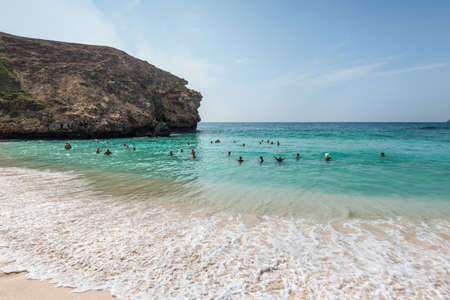 Salalah, Oman - November 19, 2019: People are resting and relaxing on the sunny Oasis Beach in Oman, Indian Ocean.のeditorial素材