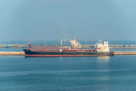 Salalah, Oman - November 19, 2019: Oil Chemical Tanker Bunga Angelica moored in Port of Salalah in...
