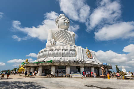 Phuket, Thailand - November 29, 2019: Many tourists and travelers visit the famous 45 meter tall Big Buddha in Phuket. Phuket is large island and a popular travel destination in southern Thailand.のeditorial素材