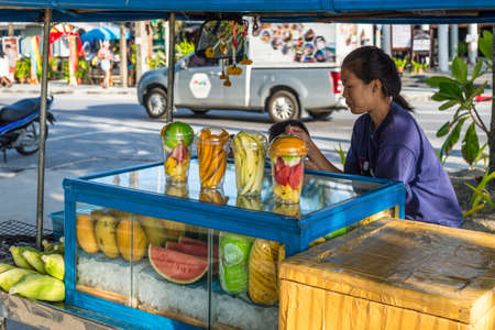 Phuket, Thailand - November 29, 2019: Street view of Phuket at sunny day with street fresh fruit on the Patong beach in Phuket island, Thailand.のeditorial素材