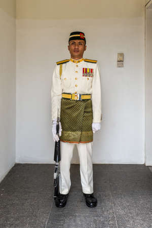 Kuala Lumpur, Malaysia - December 2, 2019: A royal guard in the National Palace of Kuala Lumpur is watchstanding in his shift before the watch changing. This special force has to protect the king.のeditorial素材