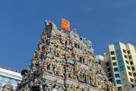 Singapore - December 4, 2019: Intricate Hindu art and deity carvings on the facade of Sri Veeramakaliamman Temple in Little India, Singapore.のeditorial素材