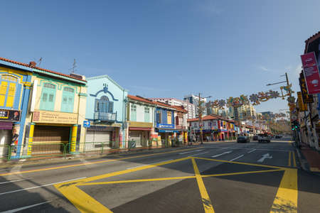 Singapore - December 4, 2019: Street wide angle view of Little India at sunny day with tourist shops in Little India, Singapore. Little India today is one of Singapore's most vibrant districts.のeditorial素材