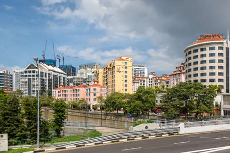 Singapore - December 4, 2019: Street scene with the Robertson Quay Hotel and Village Residence on...