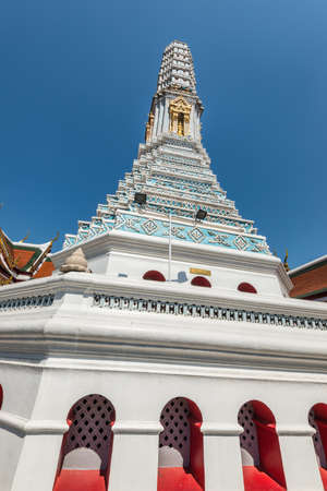 Bangkok, Thailand - December 7, 2019: White stupa at the Wat Phra Kaew - the Temple of Emerald Buddha and Bangkok's Grand Palace in Bangkok, Thailand.のeditorial素材